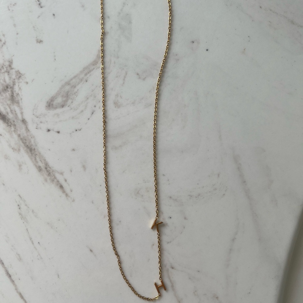 "K" and "H" 14k gold sideways initial necklace